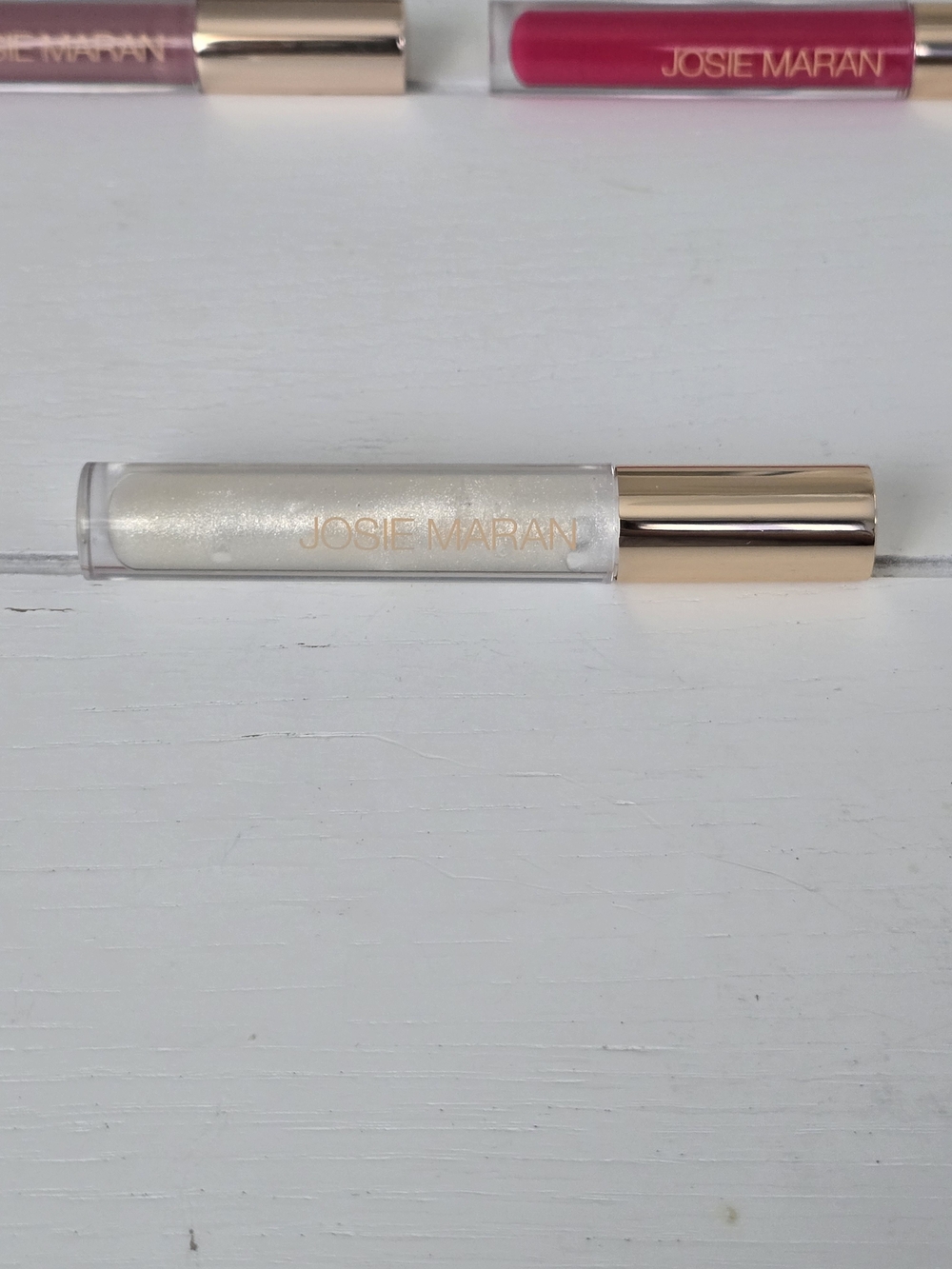1 Josie Maran Moisturizing Lip Gloss - Voluptuous,  Moondance,  Or Pink Bloom - Picture 7 of 8